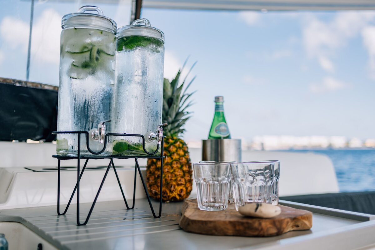 Infused water and fresh pineapple served aboard a private catamaran charter