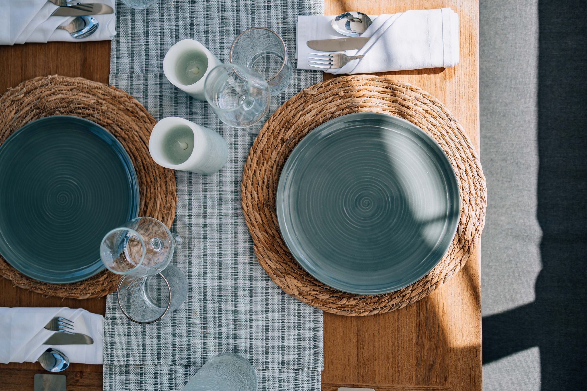 Table setting for two aboard a private catamaran charter in Bonaire